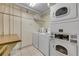 This laundry room includes multiple washers and dryers, and is well-lit and maintained at 3606 S Peninsula Dr # 509, Port Orange, FL 32127