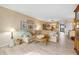 Living room with comfortable seating and access to the kitchen provides a seamless flow at 3606 S Peninsula Dr # 509, Port Orange, FL 32127
