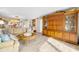 Living room with a sofa, wood floors, and a cabinet creates a cozy atmosphere at 3606 S Peninsula Dr # 509, Port Orange, FL 32127