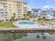The community pool overlooks the water, providing a luxurious and relaxing experience at 3606 S Peninsula Dr # 509, Port Orange, FL 32127