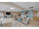 Spacious recreation room with multiple seating areas for entertaining at 3606 S Peninsula Dr # 509, Port Orange, FL 32127