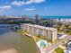Aerial showcases condo, Intracoastal Waterway, coastline and cityscape views at 3606 S Peninsula Dr # 703, Port Orange, FL 32127