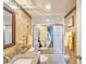 Bathroom showcasing granite counters and a shower-tub combo with decorative door at 3606 S Peninsula Dr # 703, Port Orange, FL 32127