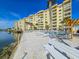 Waterfront building with community pool and deck on the water's edge at 3606 S Peninsula Dr # 703, Port Orange, FL 32127