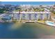 Aerial view showing the Admiralty Club's proximity to the water, pool, and beach at 3606 S Peninsula Dr # 703, Port Orange, FL 32127