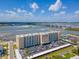 An aerial shot of the Admiralty Club, set on the water and near the bridge at 3606 S Peninsula Dr # 703, Port Orange, FL 32127