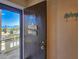 Condo front door with welcome decorations offering a beach view from the balcony at 3606 S Peninsula Dr # 703, Port Orange, FL 32127