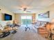 Bright and airy living room with views from the sliding glass doors at 3606 S Peninsula Dr # 703, Port Orange, FL 32127