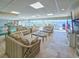 Large common lounge with multiple seating areas and views of the water at 3606 S Peninsula Dr # 703, Port Orange, FL 32127