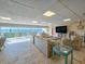 Large common lounge with comfortable seating and views of the water at 3606 S Peninsula Dr # 703, Port Orange, FL 32127