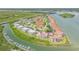 Scenic aerial shot of a residential community, nestled along a river with convenient marina access at 402 Bouchelle Dr # 206, New Smyrna Beach, FL 32169