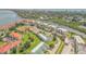 Overhead shot of a community with well-manicured green spaces, boat docks, and waterway views at 402 Bouchelle Dr # 206, New Smyrna Beach, FL 32169