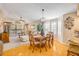 Open floor plan with dining area near the living room and large windows at 402 Bouchelle Dr # 206, New Smyrna Beach, FL 32169