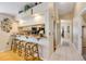 Kitchen counter with seating, modern appliances and lots of storage space at 402 Bouchelle Dr # 206, New Smyrna Beach, FL 32169