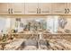 Stylish kitchen featuring granite countertops and a view to the cozy living area at 402 Bouchelle Dr # 206, New Smyrna Beach, FL 32169
