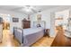 Comfortable bedroom with hardwood floors and natural light at 416 Western Rd, New Smyrna Beach, FL 32168