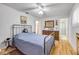 Comfortable bedroom with white walls, light floors, and natural light at 416 Western Rd, New Smyrna Beach, FL 32168