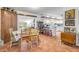 Bright eat-in kitchen with white cabinets and a breakfast bar at 416 Western Rd, New Smyrna Beach, FL 32168