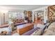 Inviting living room features eclectic furniture and natural light at 416 Western Rd, New Smyrna Beach, FL 32168