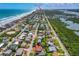 Coastal home located in a desirable area of Ponce Inlet, featuring a well-manicured lawn at 4262 Cardinal Blvd, Port Orange, FL 32127
