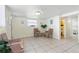 This comfortable basement area offers tiled floors and wicker seating, with a well-lit bathroom nearby at 4262 Cardinal Blvd, Port Orange, FL 32127