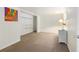 Spacious bedroom with tan carpet, large closet and wicker decor at 4262 Cardinal Blvd, Port Orange, FL 32127