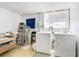 Laundry room featuring a washer, dryer, and utility sink at 4262 Cardinal Blvd, Port Orange, FL 32127