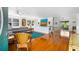 Bright living room with hardwood floors, comfortable seating, and sliding doors to the outdoors at 4262 Cardinal Blvd, Port Orange, FL 32127