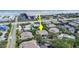 An aerial view of a charming condo complex near the ocean, showcasing nearby beach access and lush landscaping at 4307 Sea Mist Dr # 135, New Smyrna Beach, FL 32169