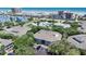 Aerial view of the condo building showing lush trees, landscaping, and access to the beach at 4307 Sea Mist Dr # 135, New Smyrna Beach, FL 32169
