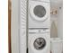 Convenient laundry area features stackable washer and dryer at 4307 Sea Mist Dr # 135, New Smyrna Beach, FL 32169