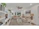 Bright living room with neutral tones, comfortable seating, and natural light for a cozy atmosphere at 4307 Sea Mist Dr # 135, New Smyrna Beach, FL 32169
