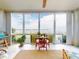 Inviting lanai featuring tile floors and panoramic waterfront views at 438 Bouchelle Dr # 104, New Smyrna Beach, FL 32169