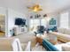 Bright living room with waterfront views, stylish furnishings, and coastal decor at 438 Bouchelle Dr # 104, New Smyrna Beach, FL 32169