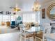 Bright living room with waterfront views, stylish furnishings, and coastal decor at 438 Bouchelle Dr # 104, New Smyrna Beach, FL 32169