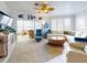 Bright living room with waterfront views, stylish furnishings, and coastal decor at 438 Bouchelle Dr # 104, New Smyrna Beach, FL 32169