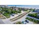 Aerial view of a neighborhood, community tennis court, beach access and nearby water views at 4431 Doris Dr, New Smyrna Beach, FL 32169