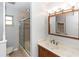 Bathroom with updated sink and tiled shower and bathtub at 4431 Doris Dr, New Smyrna Beach, FL 32169