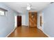 Bedroom boasts natural lighting, ceiling fan, and wood flooring at 4431 Doris Dr, New Smyrna Beach, FL 32169