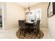 Bright breakfast nook featuring a modern chandelier and a dining table with seating for six at 481 Sweet Bay Ave, New Smyrna Beach, FL 32168