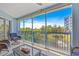 Inviting balcony with comfortable seating and picturesque views of the landscape at 5300 S Atlantic Ave # 14-202, New Smyrna Beach, FL 32169