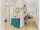 Inviting hallway with stylish decor leading to a bedroom and dining area at 5300 S Atlantic Ave # 14-202, New Smyrna Beach, FL 32169