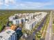 Expansive aerial shot of condo complex with easy access to amenities and convenient parking at 5300 S Atlantic Ave # 16-205, New Smyrna Beach, FL 32169