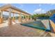 Bocce ball court and covered lounge seating are popular with community residents and their guests at 5300 S Atlantic Ave # 16-205, New Smyrna Beach, FL 32169