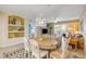 Comfortable dining space flowing into the living area, perfect for entertaining and enjoying natural light at 5300 S Atlantic Ave # 16-205, New Smyrna Beach, FL 32169