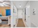 Welcoming entryway with a shoe storage cabinet, and access to well-appointed bedrooms at 5300 S Atlantic Ave # 16-205, New Smyrna Beach, FL 32169