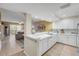 Open kitchen design seamlessly connects to the living space, creating an inviting atmosphere at 5300 S Atlantic Ave # 16-205, New Smyrna Beach, FL 32169