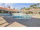 This large community pool with lounge chairs is the perfect place to cool off on a hot day at 5300 S Atlantic Ave # 16-205, New Smyrna Beach, FL 32169