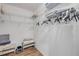 Spacious walk-in closet with ample shelving and hanging space at 5300 S Atlantic Ave # 16-205, New Smyrna Beach, FL 32169