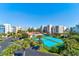 Aerial view of the condominium community featuring tennis courts and buildings at 5300 S Atlantic Ave # 20-507, New Smyrna Beach, FL 32169